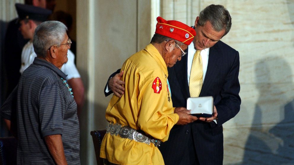 PHOTO: President George W. Bush presents the Gold Medal to John Brown, Jr., Navajo Code Talker, during the Gold Medal Ceremony at the Capitol in Washington, D.C. 