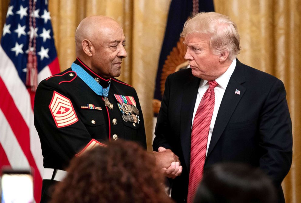 PHOTO: President Donald Trump shakes hands with Retired U.S. Marine Sergeant Major John L. Canley, after awarding him the Medal of Honor for actions during the Vietnam War, at a ceremony in the East Room of the White House, Oct. 17, 2018.