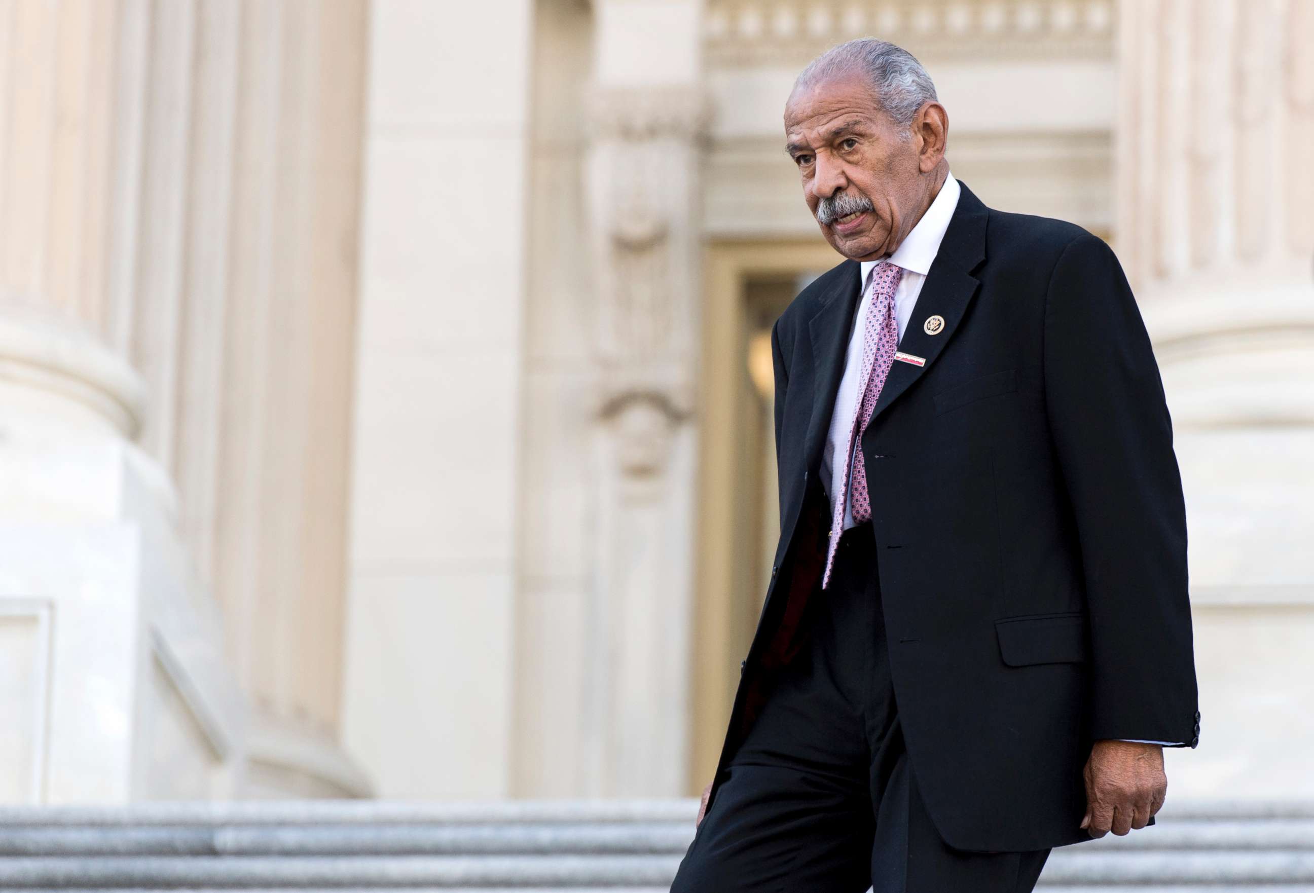 PHOTO: Rep. John Conyers walks down the House steps after a vote in the Capitol, Sept. 27, 2016.