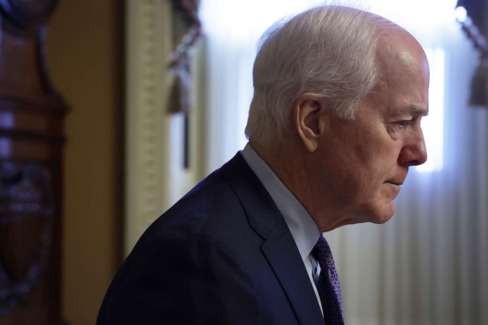 PHOTO: Senate John Cornyn walks down a hallway ahead of a weekly Senate Republican policy luncheon at the US Capitol on May 10, 2022 in Washington, D.C. 