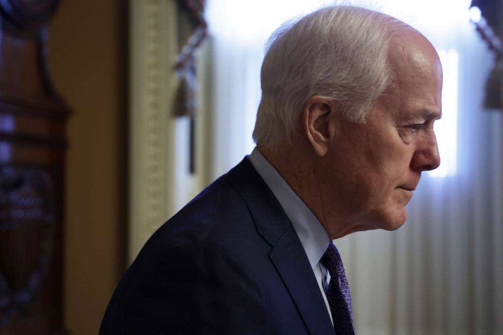 PHOTO: Sen. John Cornyn walks in a hallway prior to a weekly Senate Republican policy luncheon at the U.S. Capitol on May 10, 2022 in Washington, DC.