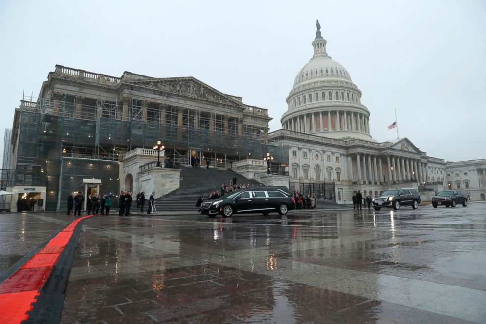 PHOTO: A hearse carrying the casket of former Rep. John Dingell, D-Mich., drives along the East Front of the U.S. Capitol, Feb. 12, 2019, in Washington.