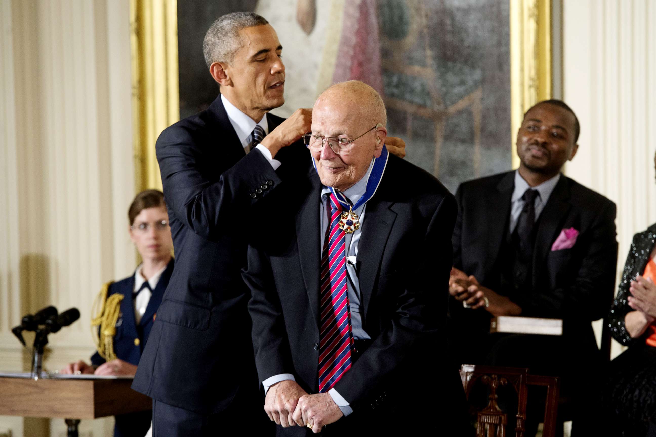 PHOTO: John Dingell, the longest serving Member of Congress in US history, is awarded the Presidential Medal of Freedom by US President Barack Obama, left, during a ceremony in the East Room of the White House, Nov. 24, 2014.