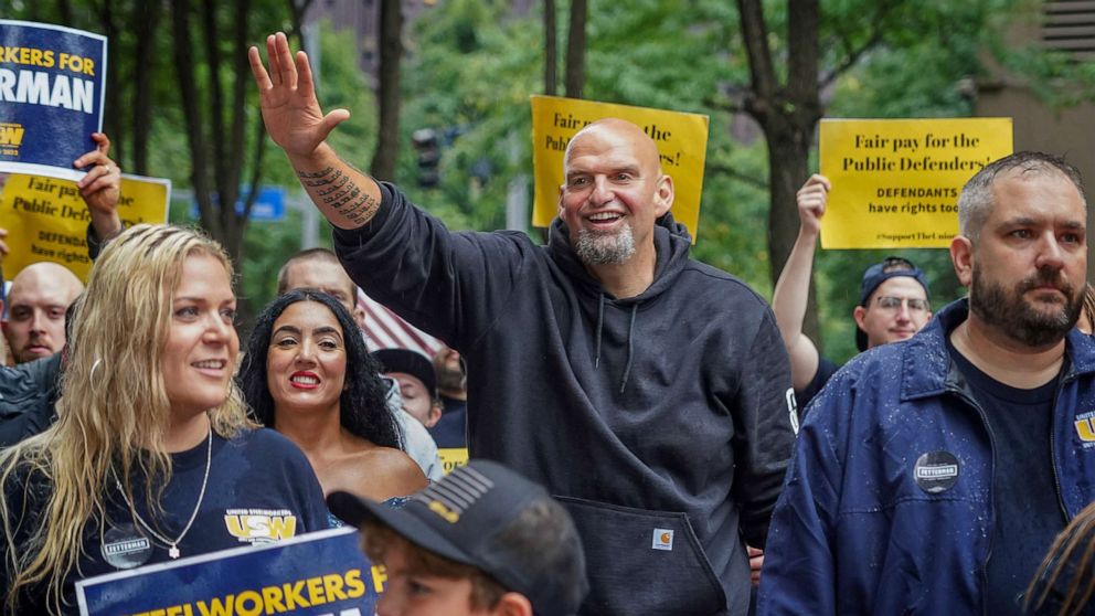 PHOTO: John Fetterman, Pennsylvania's Democratic lieutenant governor and senate candidate, waves to supporters during a Labor Day parade in Downtown Pittsburgh, on Sept. 5, 2022.