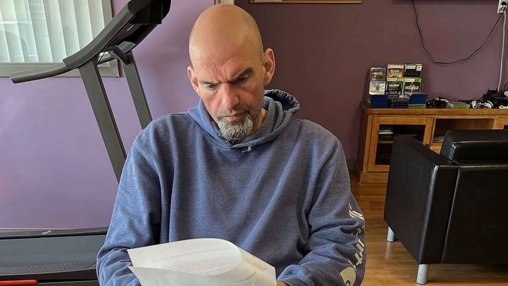 PHOTO: Sen. John Fetterman reviewing documents on rail safety legislation and the Farm Bill while at the Walter Reed National Military Medical Center in Washington, Mar.6, 2023 in a photo posted by his Chief of Staff to Twitter.