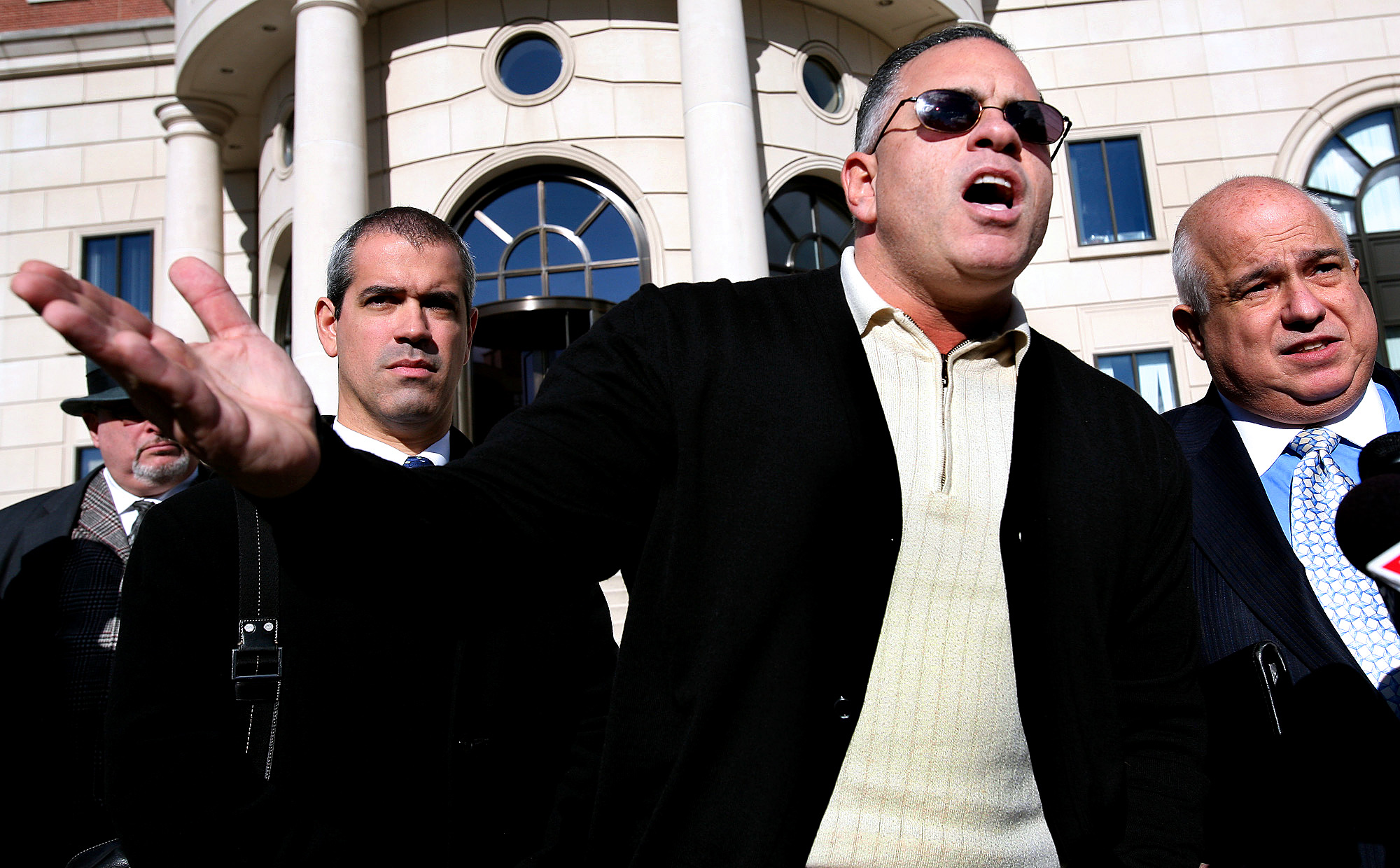 PHOTO: John A. "Junior" Gotti, center, son of the late Gambino family crime boss, speaks after a hearing on his tax payment status outside the Federal Court House in White Plains, N.Y., Nov. 27, 2007.