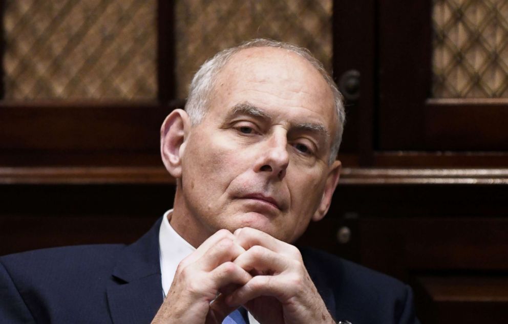 PHOTO: White House Chief of Staff John Kelly listens to President Donald Trump during a working lunch with governors in the Roosevelt Room of the White House, in Washington, DC, June 21, 2018.