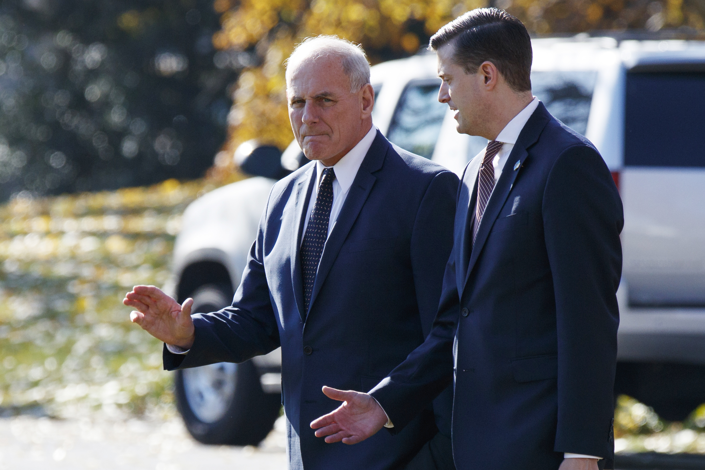 PHOTO: White House Chief of Staff John Kelly walks with White House staff secretary Rob Porter to board Marine One on the South Lawn of the White House in Washington, Nov. 29, 2017.