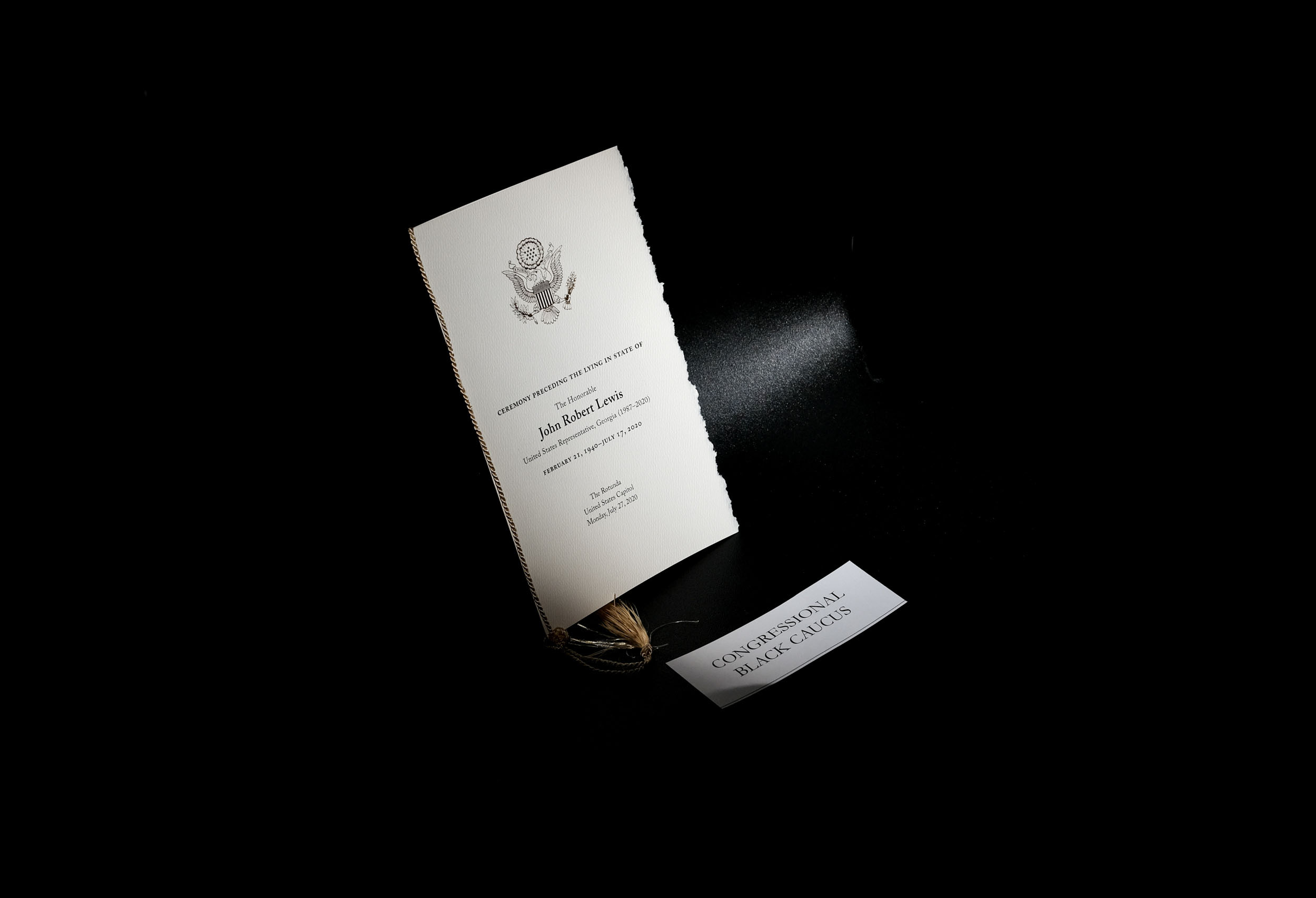 PHOTO: A program is seen on a seat prior to a service honoring the late Rep. John Lewis at the U.S. Capitol Rotunda in Washington, D.C., July 27, 2020.