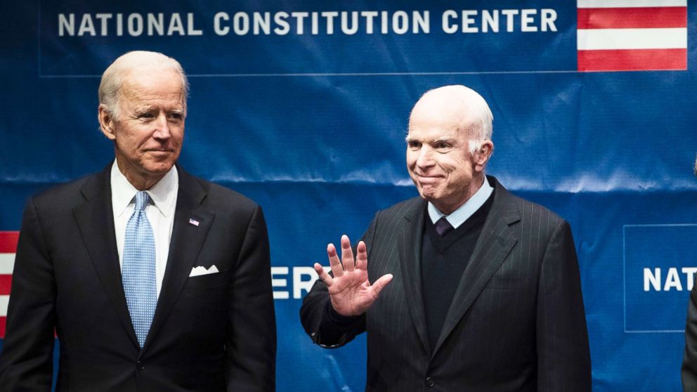 PHOTO: Sen. John McCain, right, accompanied by Chair of the National Constitution Center's Board of Trustees, former Vice President Joe Biden, waves as he takes the stage before receiving the Liberty Medal in Philadelphia, Oct. 16, 2017.