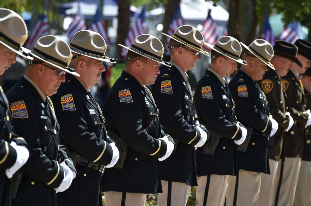 PHOTO: Members of the Arizona Department of Public Safety line up before the casket of Senator John McCain is carried by members of the Arizona National Guard to the Arizona State Capitol Rotunda where he will lie in state, Aug. 29, 2018 in Phoenix.