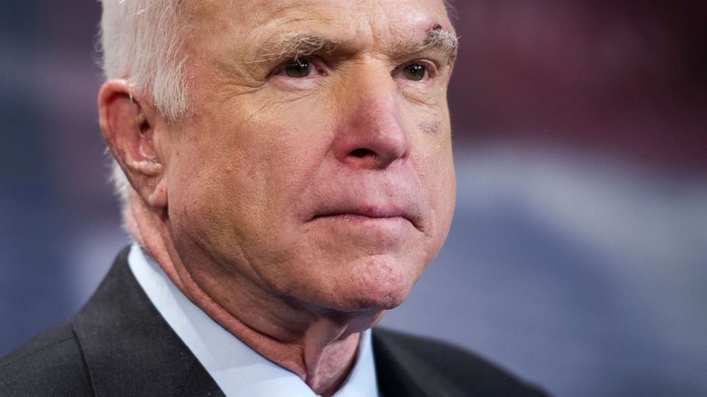 Sen. John McCain speaks to reporters on Capitol Hill in Washington, July 27, 2017. The Senate voted decisively to approve a new package of stiff financial sanctions against Russia, Iran, and North Korea, sending the popular bill to President Donald Trump for his signature after weeks of intense negotiations.