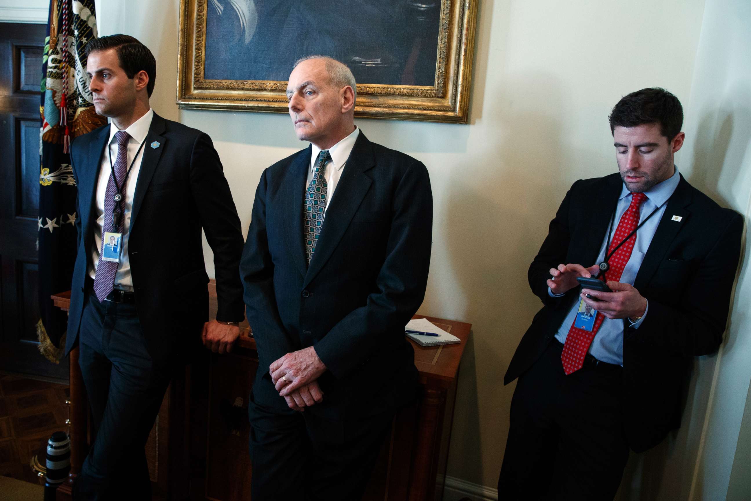 PHOTO: John McEntee and John Kelly listen as President Donald Trump speaks during a meeting with lawmakers about trade policy in the Cabinet Room of the White House, Tuesday, Feb. 13, 2018, in Washington.