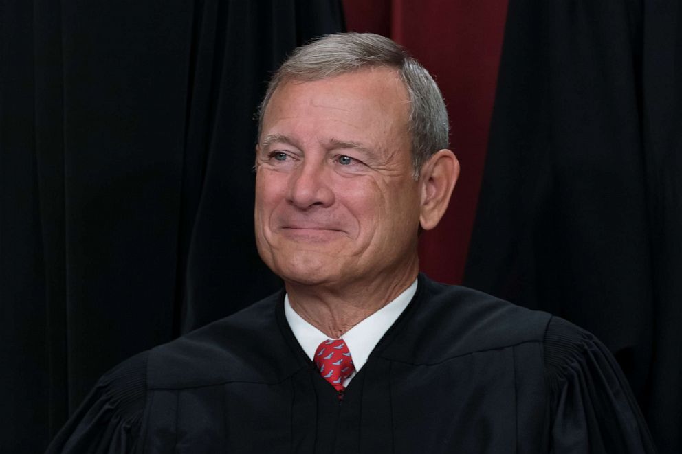 PHOTO: Chief Justice of the United States John Roberts poses for a group portrait, at the Supreme Court building in Washington, Oct. 7, 2022.