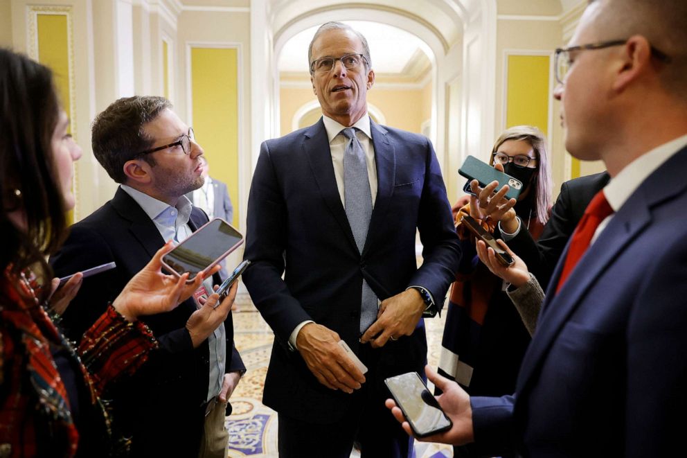 PHOTO: In this Dec. 20, 2022, file photo, Senate Minority Whip John Thune talks to reporters before heading into the Senate Chamber, at the U.S. Capitol in Washington, D.C.