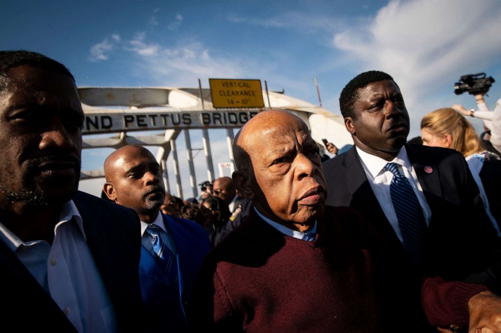 PHOTO: Rep. John Lewis crosses the Edmund Pettus Bridge before the 55th anniversary of the Bloody Sunday crossing, in Selma, Ala., March 1, 2020.