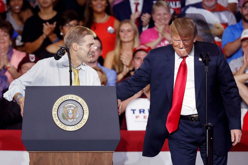 PHOTO: President Donald Trump, right, encourages Rep. Jim Jordan, left, to speak during a rally, Aug. 4, 2018, in Lewis Center, Ohio.