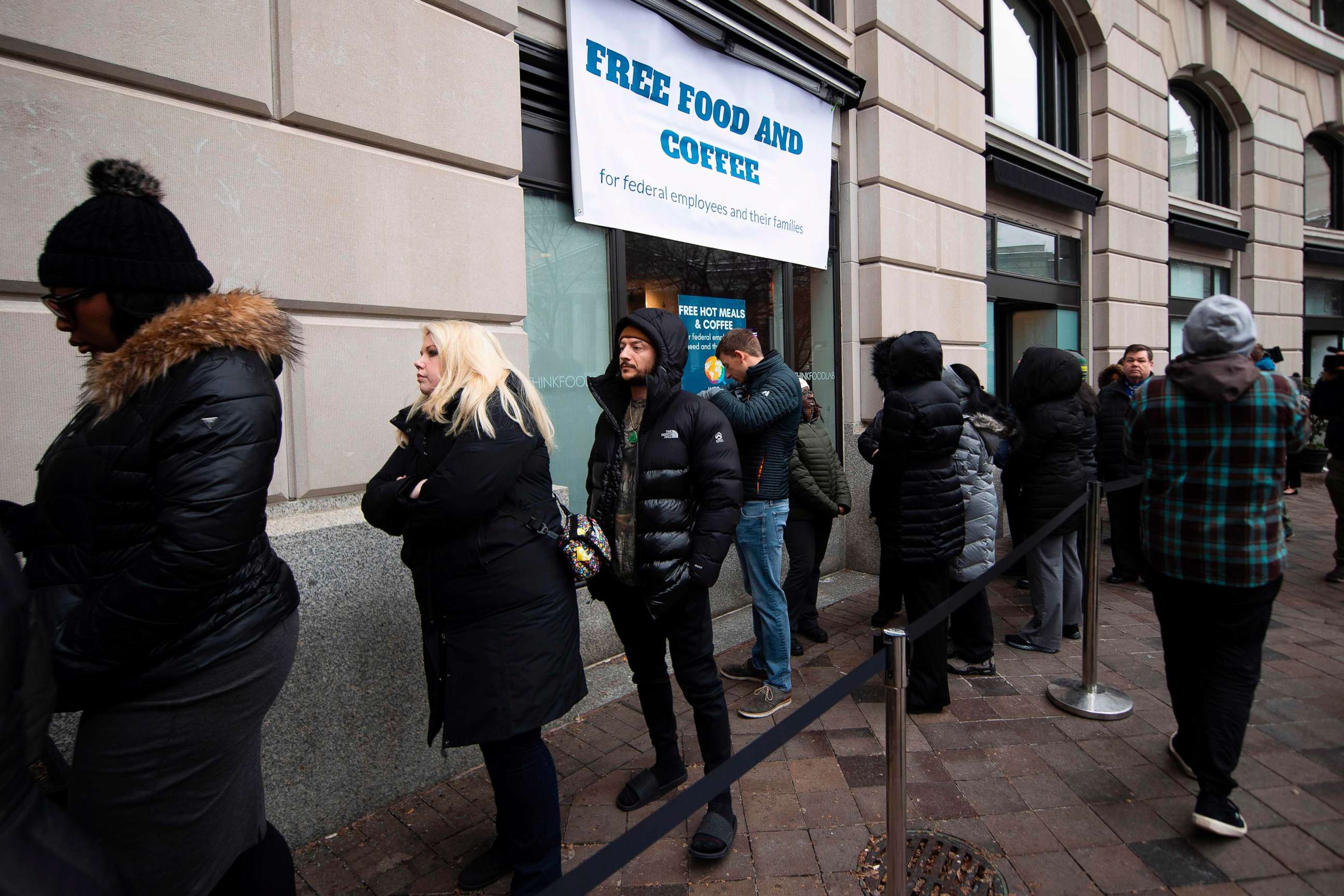 PHOTO: Federal workers stay in line for a free hot meal at Andres in Washington, Jan. 16, 2019, as the restaurant provided meals for federal families affected by the U.S. government shutdown.