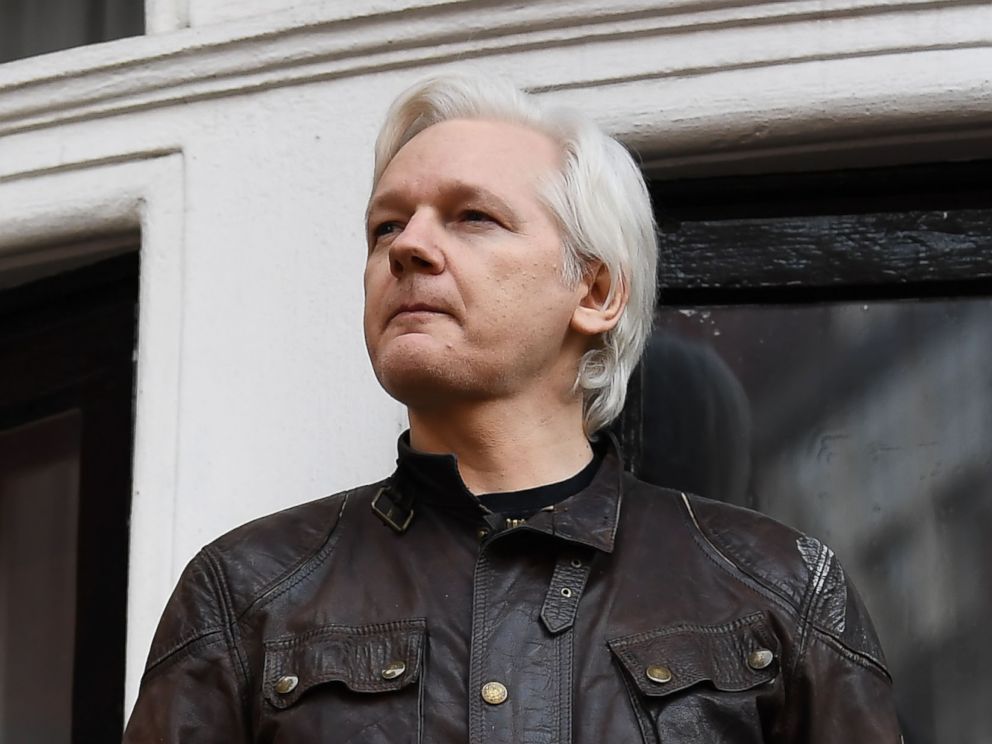 PHOTO: Wikileaks founder Julian Assange speaks to the media from the balcony of the Embassy of Ecuador in London on May 19, 2017.