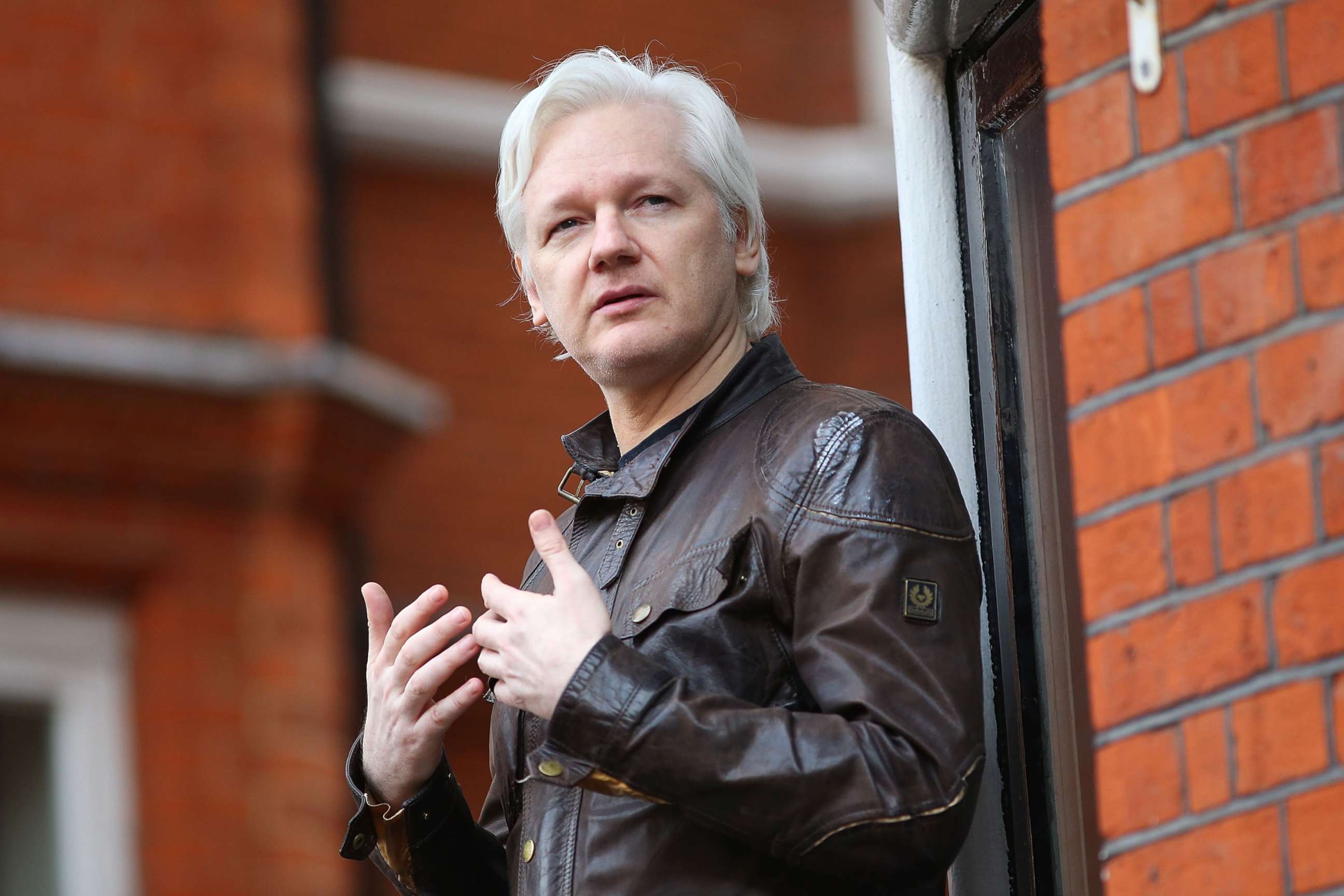 PHOTO: Julian Assange speaks to the media from the balcony of the Embassy of Ecuador, May 19, 2017, in London.