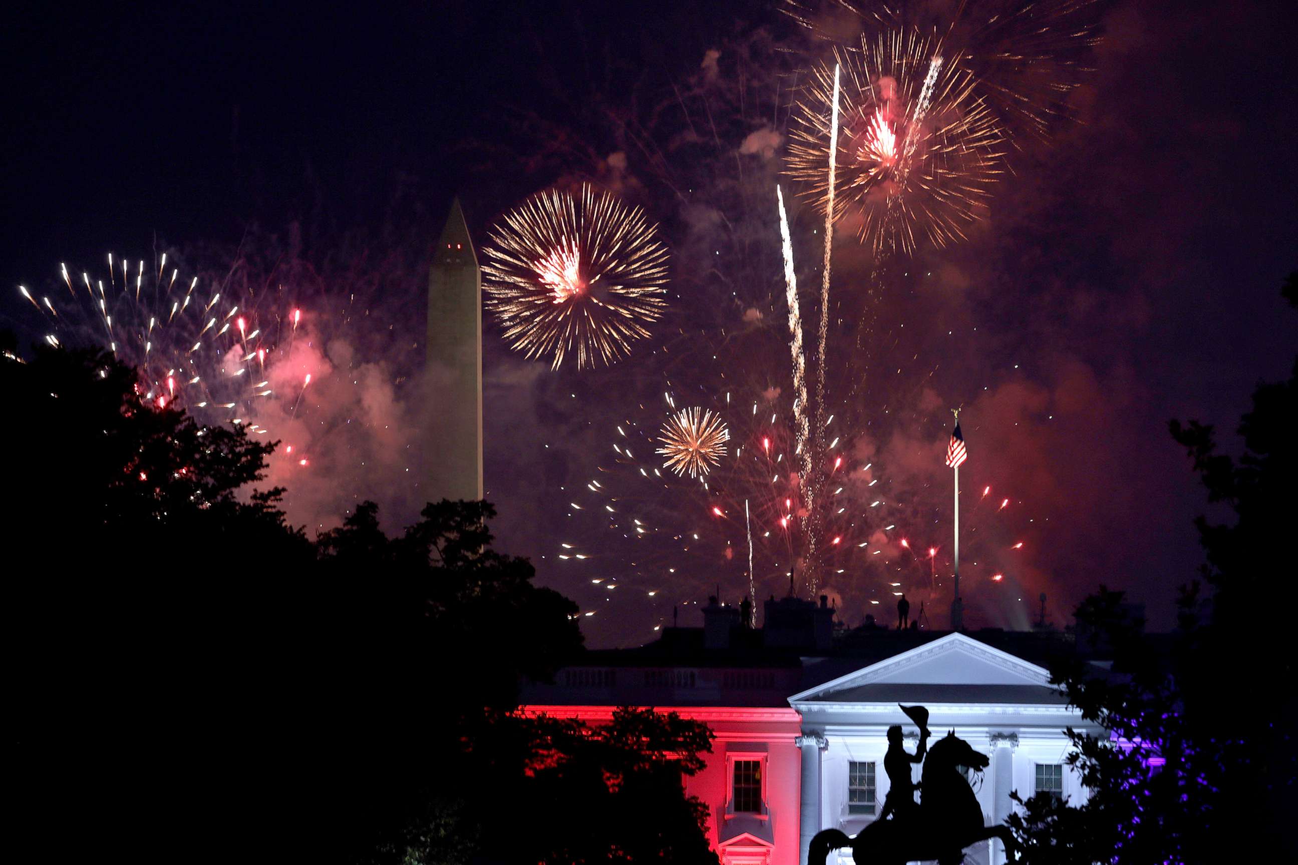 PHOTO: Fireworks explode behind the White House near the Washington Monument, July 4, 2020 in Washington, D.C.  