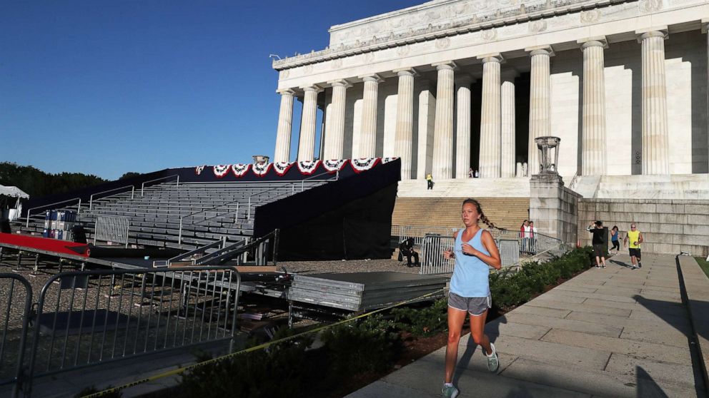 PHOTO: A jogger runs past the Lincoln Memorial ahead of the "July 4th Salute to America" celebration, July 2, 2019, in Washington, D.C.