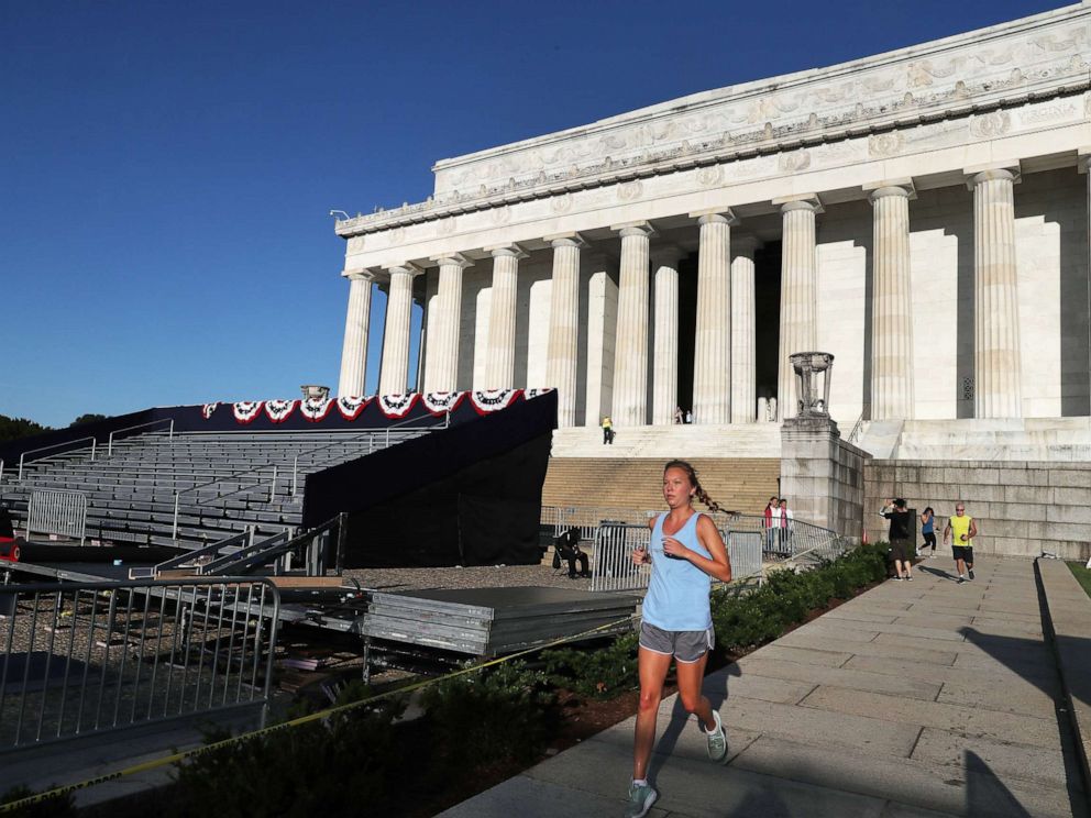 PHOTO: A jogger runs past the Lincoln Memorial ahead of the July 4th Salute to America celebration, July 2, 2019, in Washington, D.C.