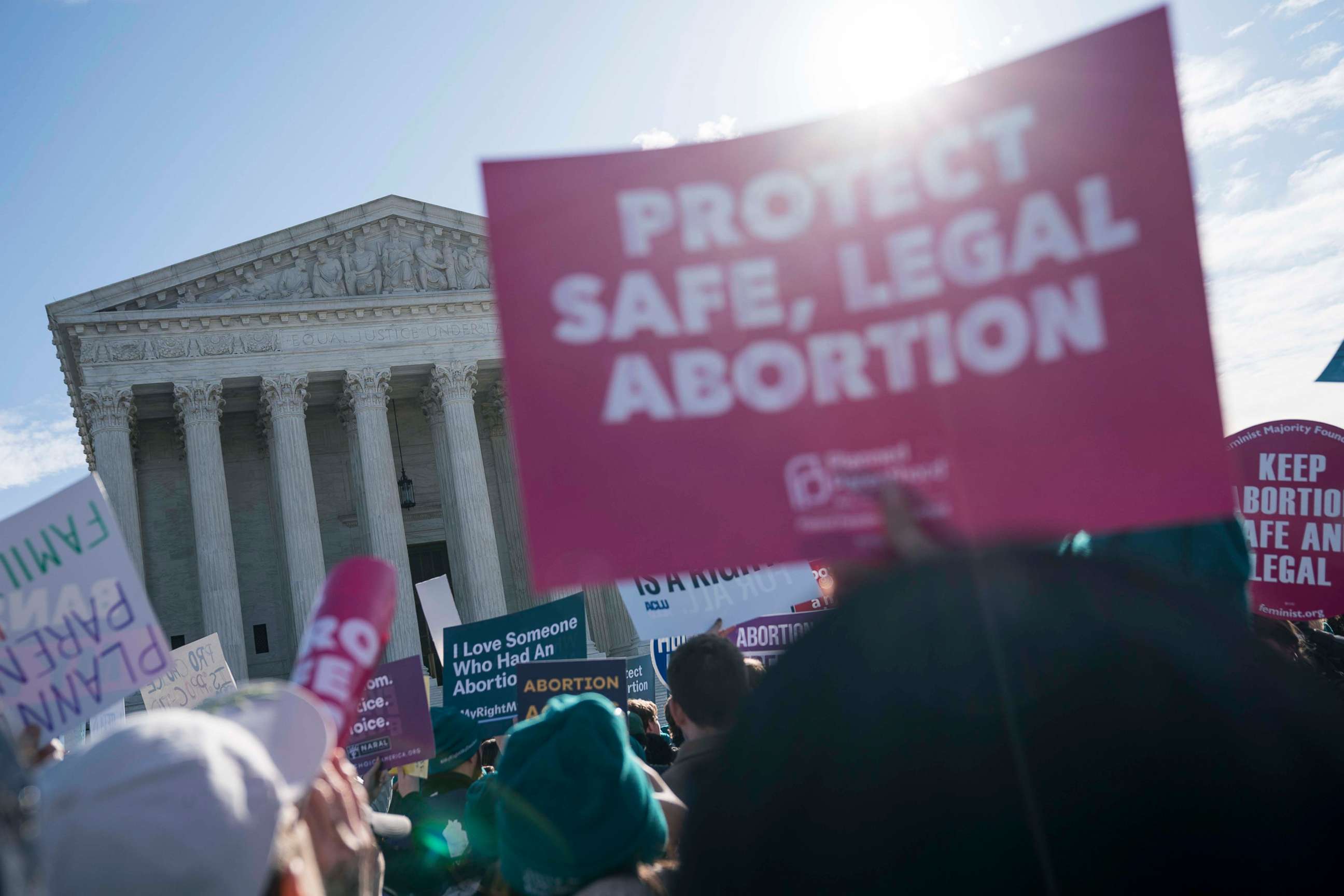 PHOTO:  People participate in an abortion rights rally outside of the Supreme Court as the justices hear oral arguments in the June Medical Services v. Russo case, March 4, 2020, in Washington, D.C. 