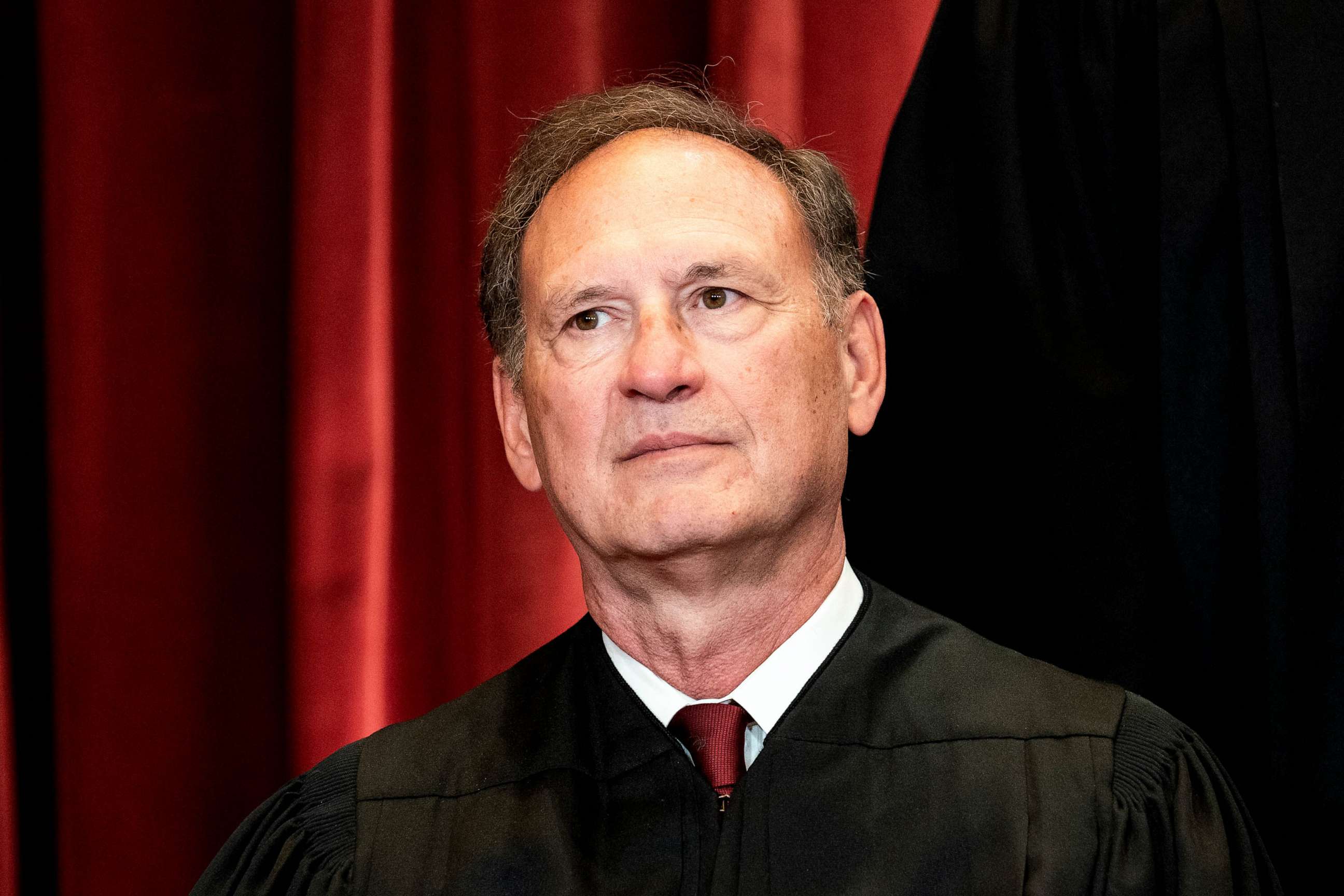 PHOTO: FILE - Justice Samuel Alito sits during a group photo of the Justices at the Supreme Court in Washington, DC, April 23, 2021.