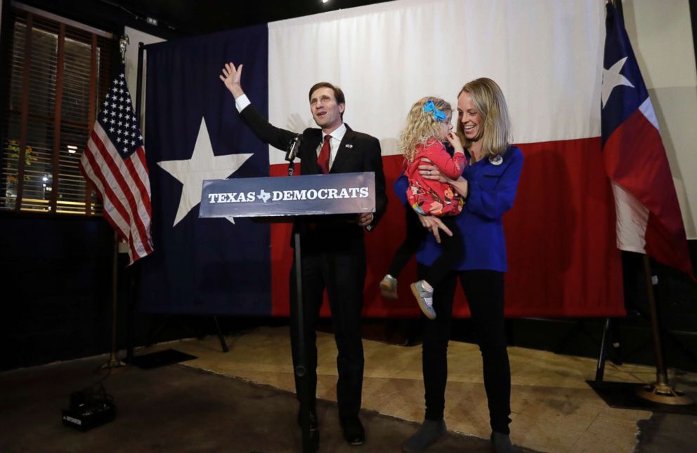 PHOTO: Democratic Texas Attorney General candidate Justine Nelson, left, with his wife Elizabeth and daughter Adeline talks to supporters during a Democratic watch party following the Texas primary election, March 6, 2018, in Austin, Texas.