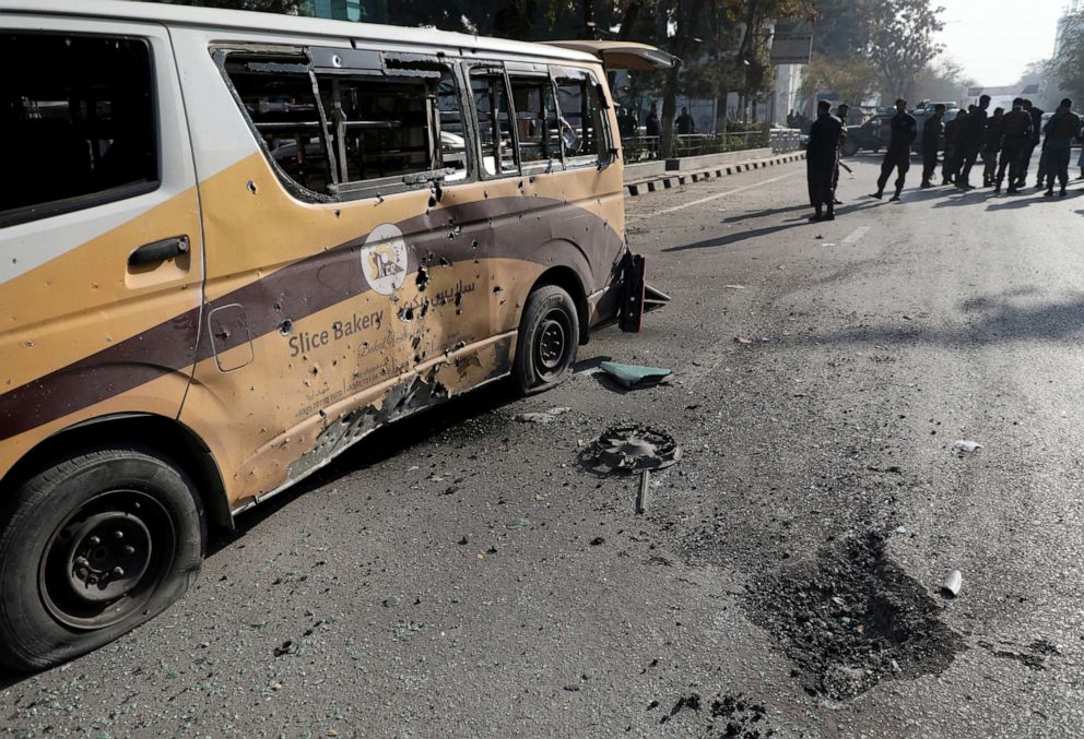 PHOTO: Police officers stand guard after rockets hit residential areas in Kabul, Afghanistan, Nov. 21, 2020.