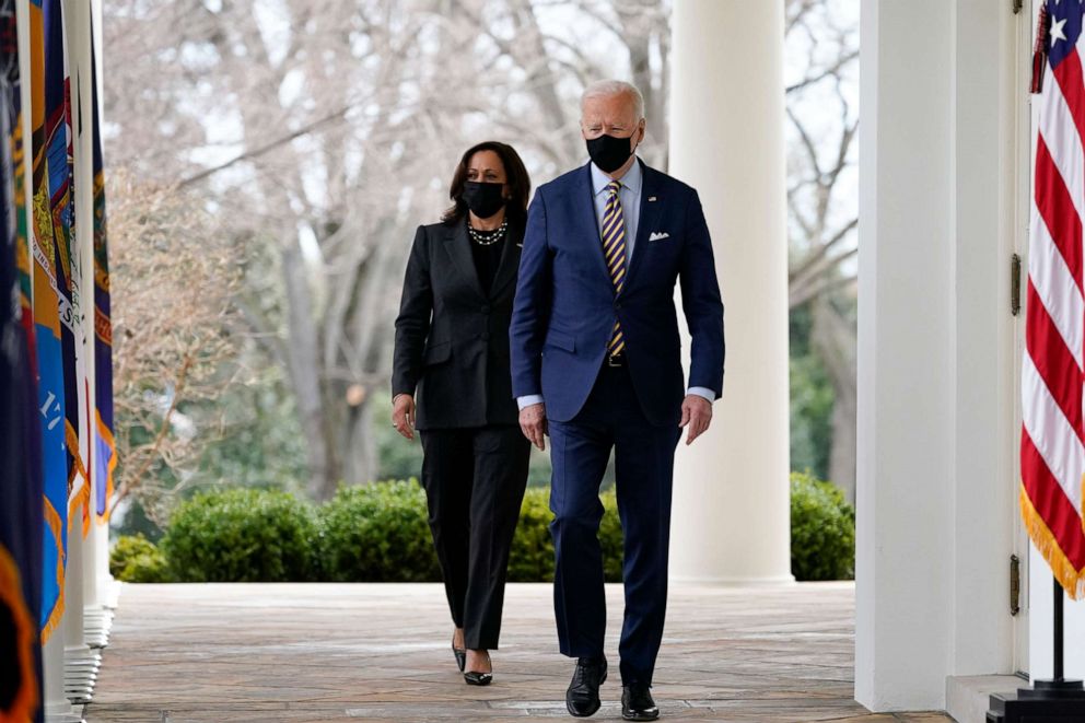 PHOTO: In this March 12, 2021, file photo, President Joe Biden and Vice President Kamala Harris walk along the White House colonnade as they arrive to speak in the Rose Garden in Washington. 