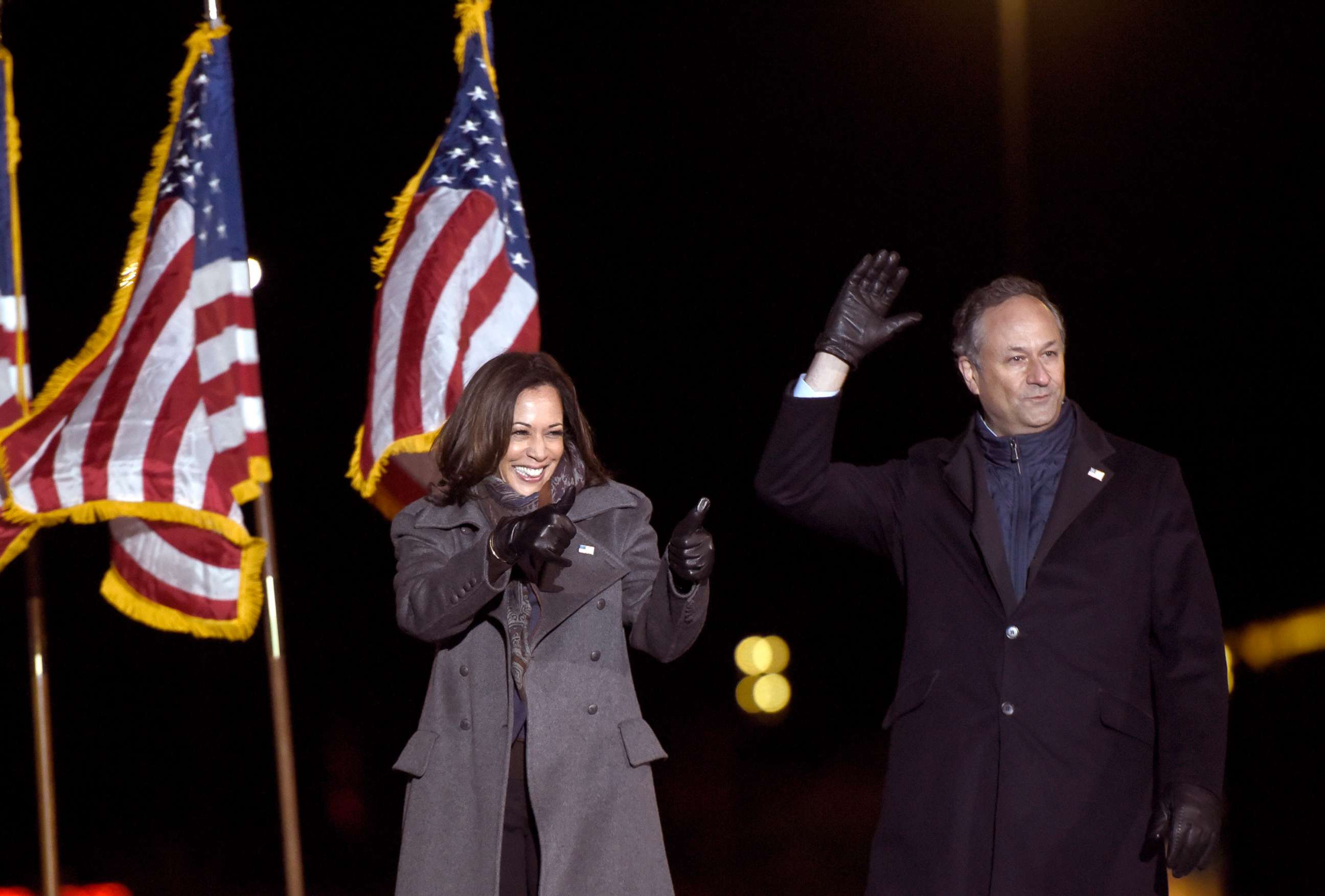 PHOTO: Sen. Kamala Harris and her husband Doug Emhoff take the stage during a drive-in get out the vote rally, Nov. 2, 2020, in Philadelphia.