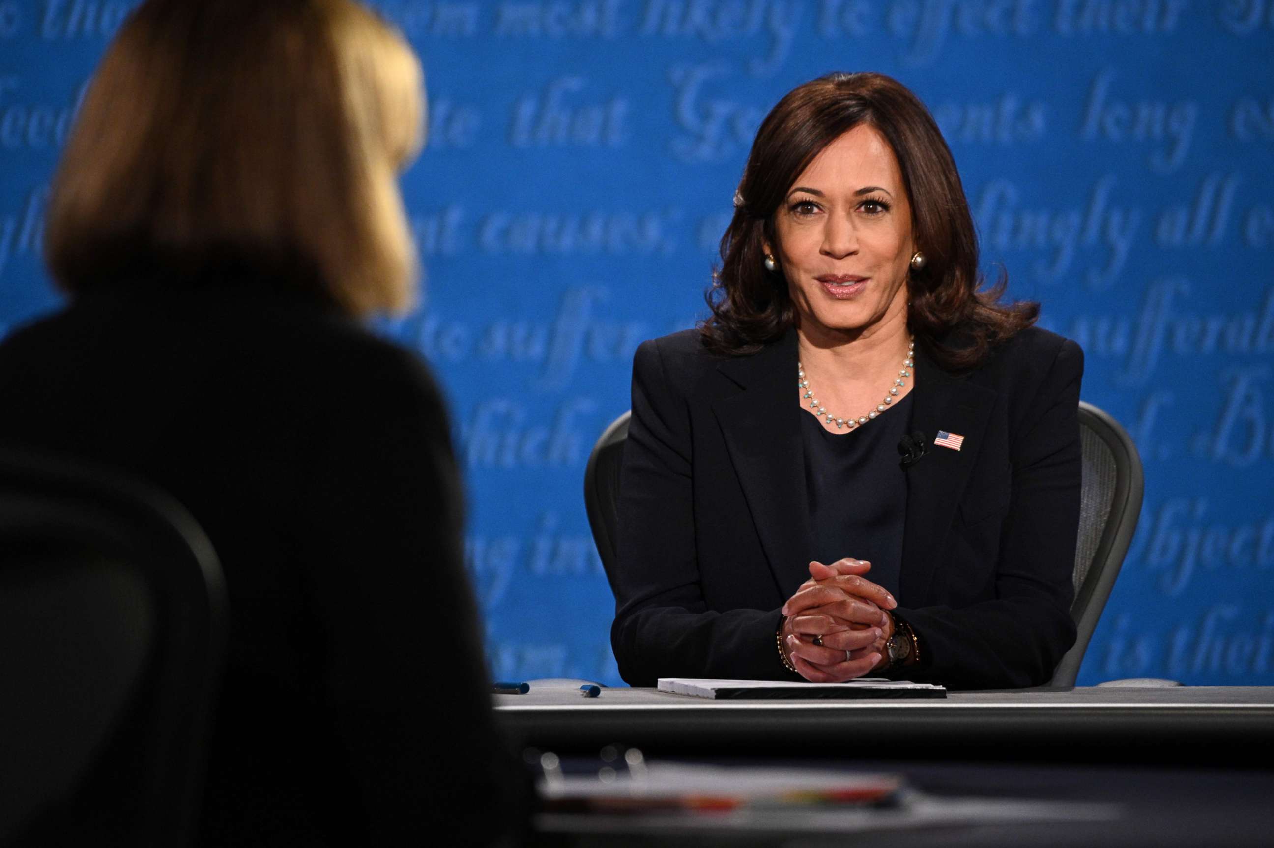 PHOTO: Democratic vice presidential nominee Kamala Harris arrives on stage for the vice presidential debate in Kingsbury Hall at the University of Utah, Oct. 7, 2020, in Salt Lake City.