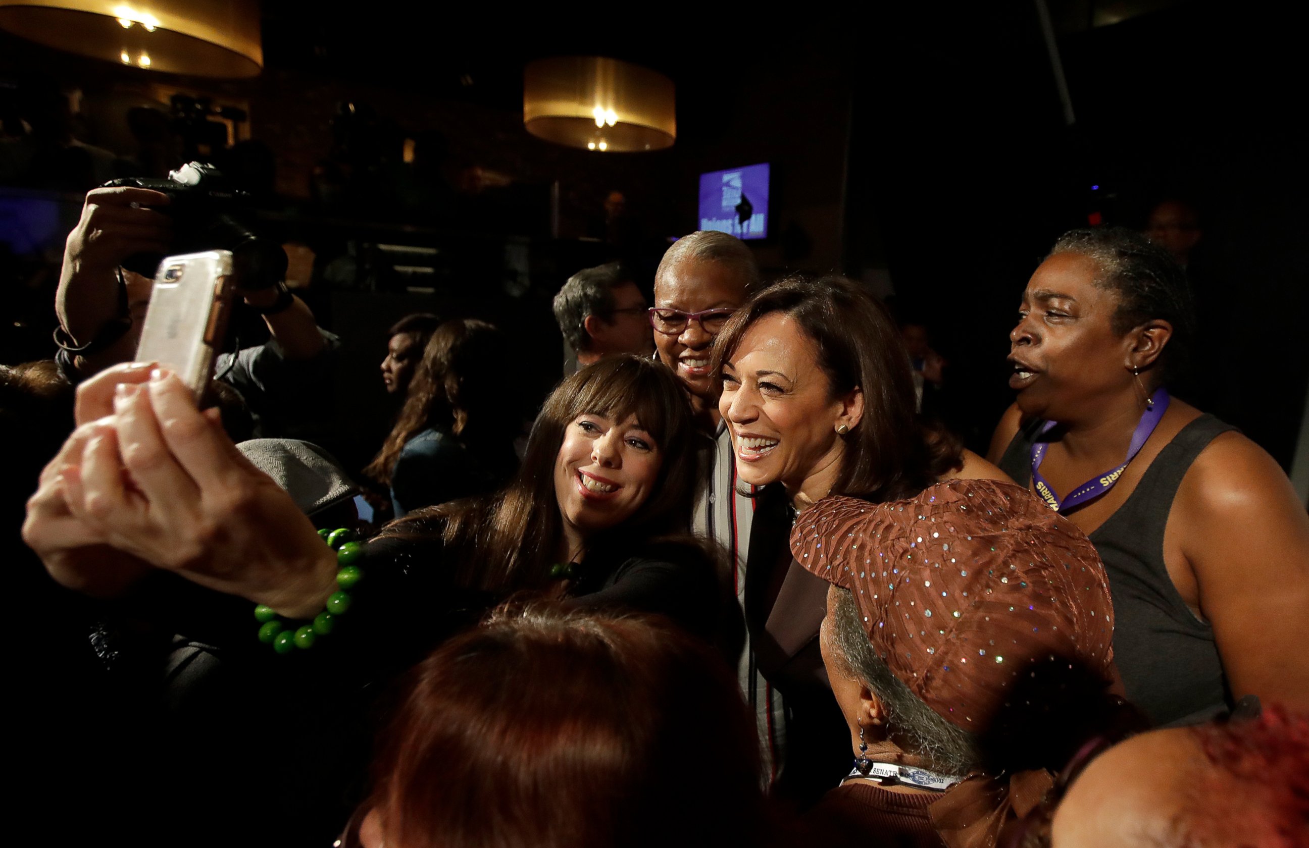 PHOTO: Democratic presidential candidate Sen. Kamala Harris, D-Calif., center right, poses for photos after speaking at an SEIU event before the 2019 California Democratic Party State Organizing Convention in San Francisco, Saturday, June 1, 2019.