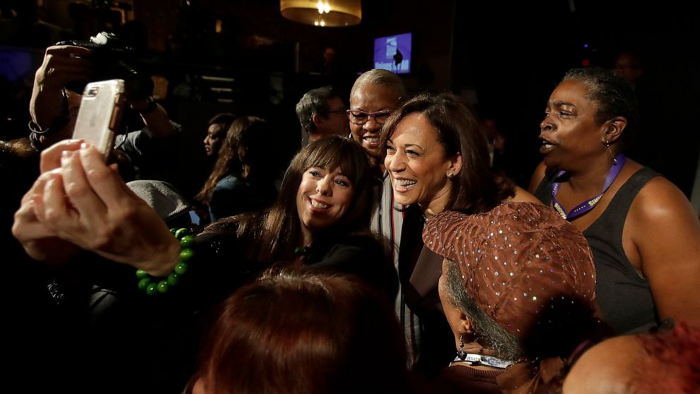 PHOTO: Democratic presidential candidate Sen. Kamala Harris, D-Calif., center right, poses for photos after speaking at an SEIU event before the 2019 California Democratic Party State Organizing Convention in San Francisco, Saturday, June 1, 2019.