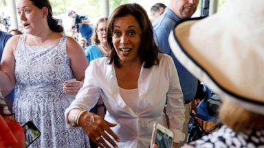 PHOTO: Democratic presidential candidate Sen. Kamala Harris greets local residents during the West Des Moines Democrats' annual picnic, Wednesday, July 3, 2019, in West Des Moines, Iowa.