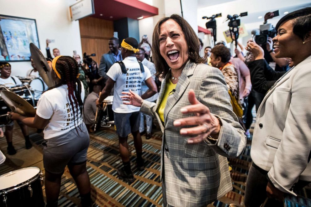 PHOTO: Democratic presidential candidate Sen. Kamala Harris dances with a marching band upon arrival at the 2019 South Carolina Democratic Party State Convention on June 22, 2019, in Columbia, S.C.