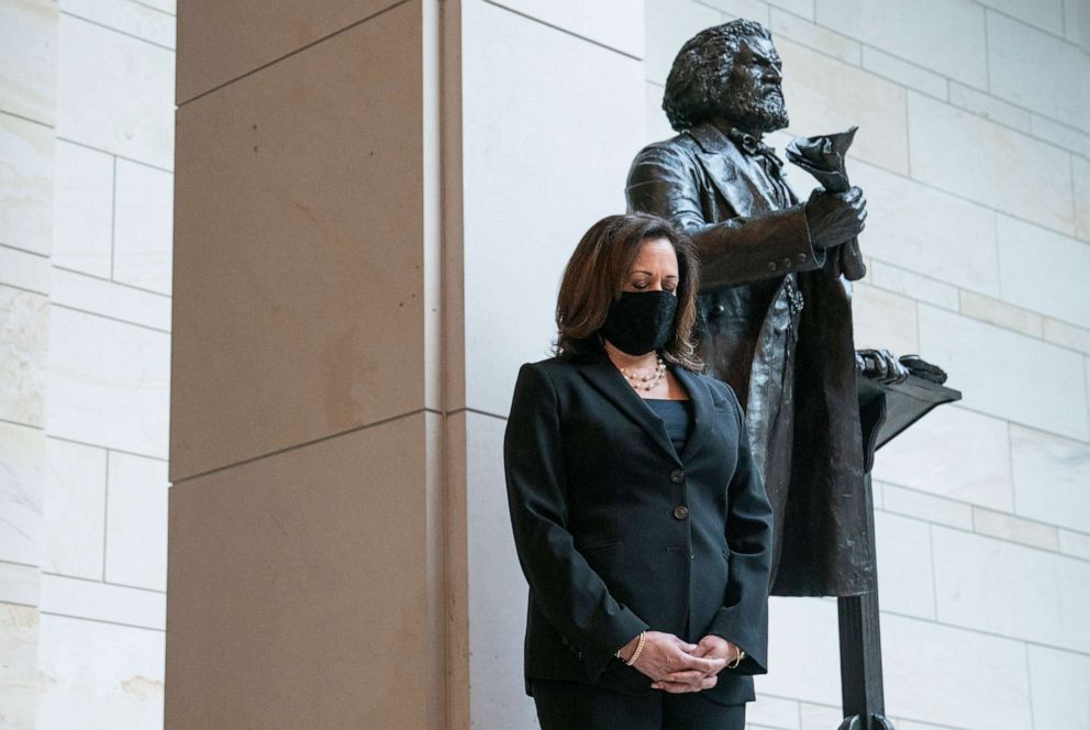 PHOTO: Sen. Kamala Harris, along with other Senate Democrats, participates in a moment of silence to honor George Floyd and the Black Lives Matter movement in Emancipation Hall of the Capitol on June 4, 2020, in Washington, DC.