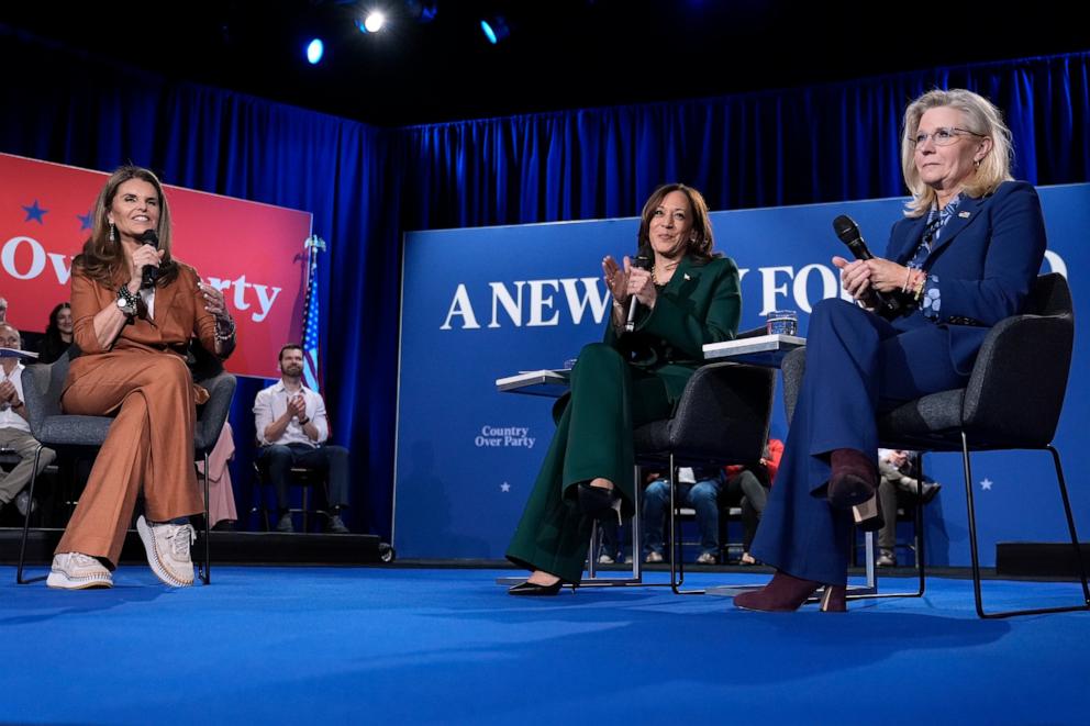 PHOTO: Moderator Maria Shriver speaks as Democratic presidential nominee Vice President Kamala Harris and former Republican Congresswoman Liz Cheney listen during a town hall at the Royal Oak Theatre in Royal Oak, Mich., Oct. 21, 2024.