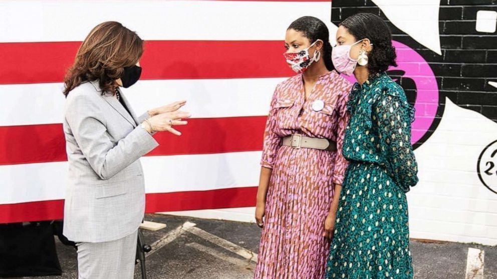 PHOTO: Robyn Sanders, right, and her twin sister Ashlyn speak with future Vice President-elect Sen. Kamala Harris in Raleigh, N.C., in September 2020.