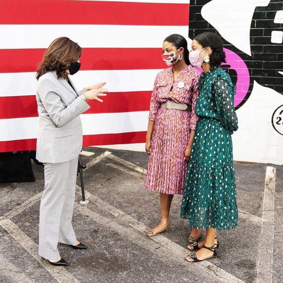 PHOTO: Robyn Sanders, right, and her twin sister Ashlyn speak with future Vice President-elect Sen. Kamala Harris in Raleigh, N.C., in September 2020.
