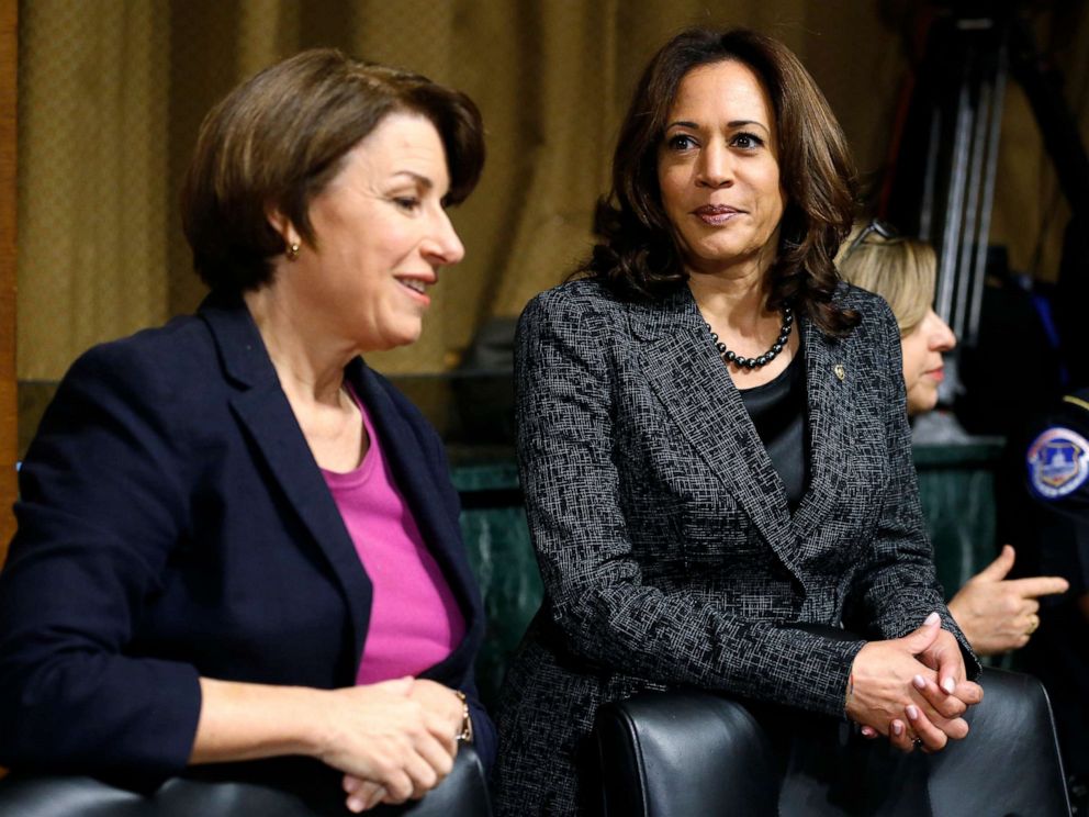 PHOTO: Senators Amy Klobuchar, D-Minn. and Kamala Harris, D-Calif., talk before the Senate Judiciary Committee hearing with Christine Blasey Ford, Sept. 27, 2018, on Capitol Hill.