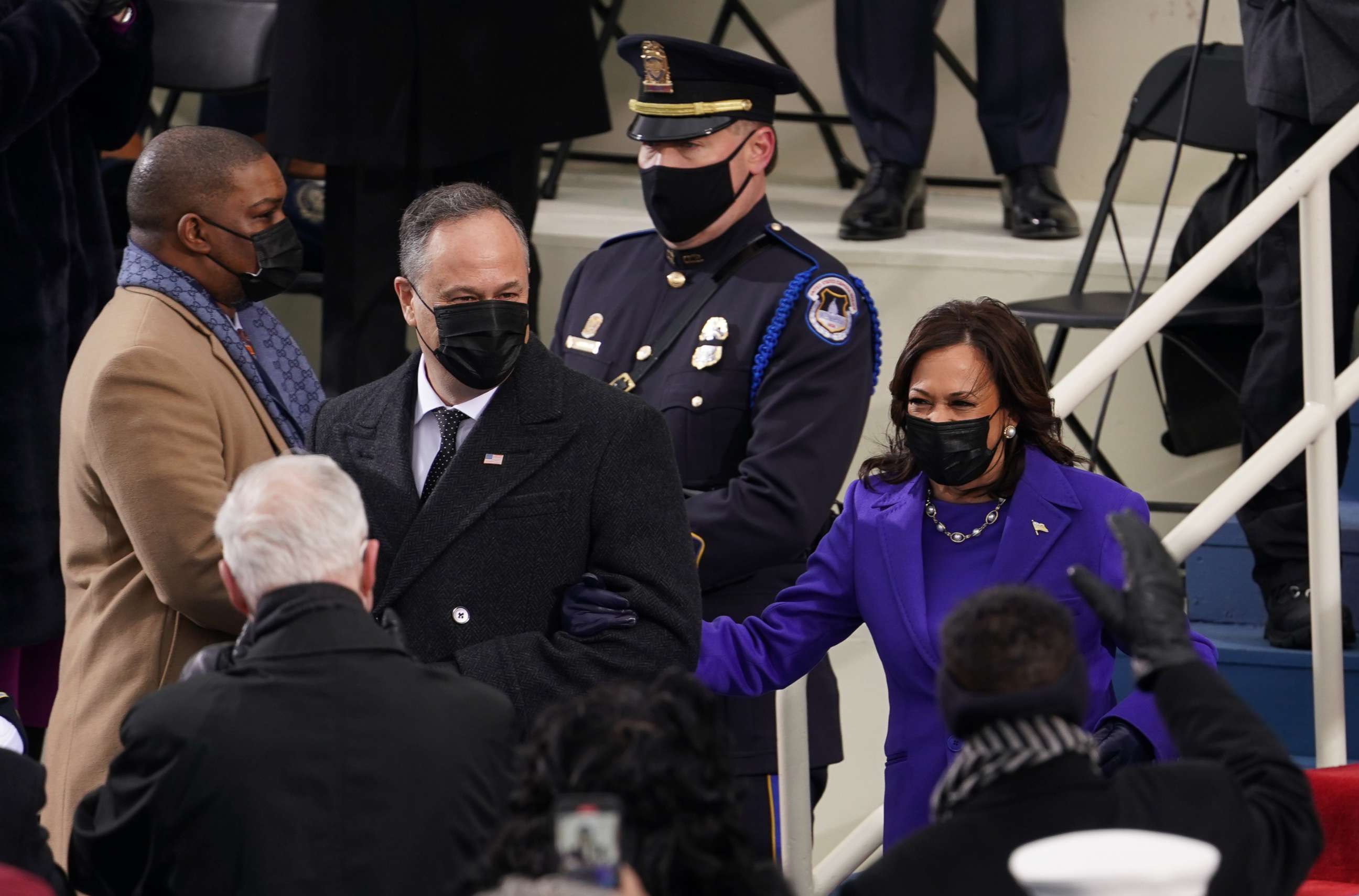 PHOTO: Vice President-elect Kamala Harris arrives with Officer Eugene Goodman, left, for the inauguration and  of Joe Biden as the 46th President of the United States on the West Front of the Capitol in Washington, Jan. 20, 2021.