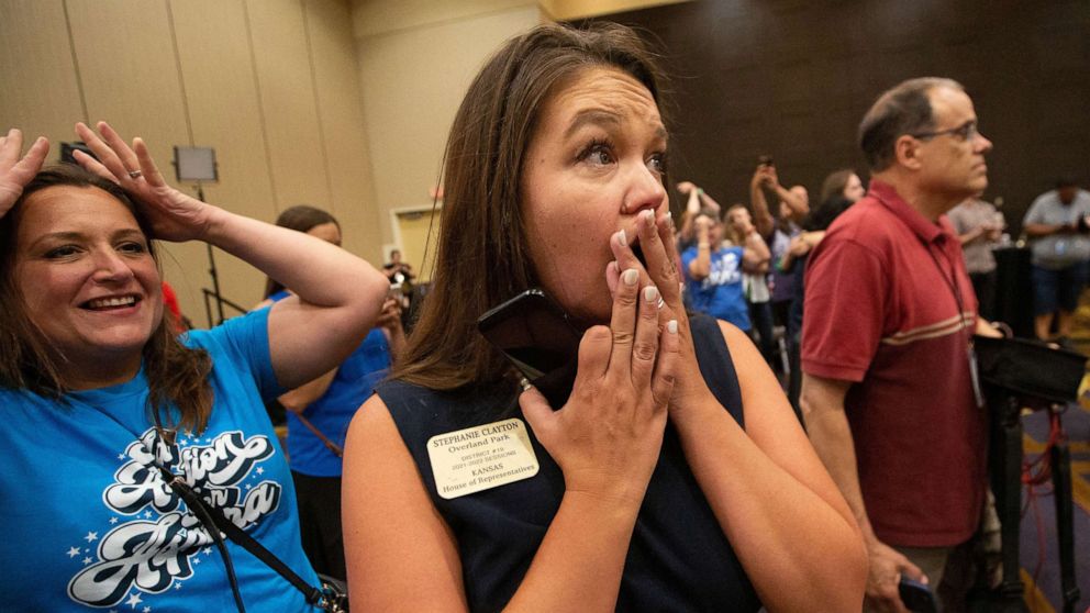 State Rep. Stephanie Clayton reacts to news that a constitutional amendment that would have declared there is no right to abortion was voted down, during the Kansans for Constitutional Freedom election watch party,in Overland Park, Kan, Aug. 8, 2022.