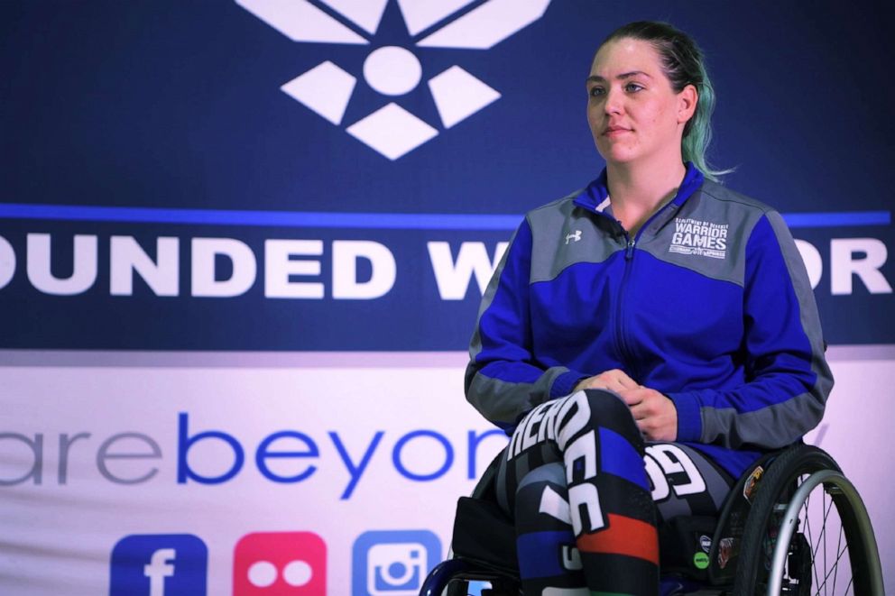 PHOTO: Karah Behrend, retired Air Force senior airman and current wheelchair rugby player, sits during an interview after a wheelchair rugby practice at Hurlburt Field, Fla, April 16, 2019.