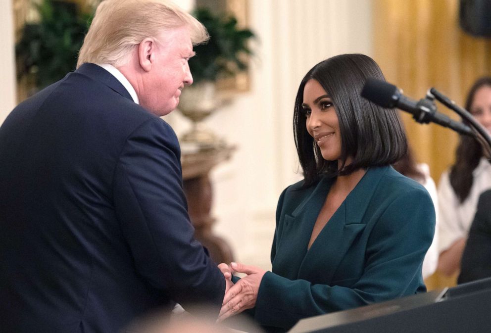 PHOTO: Kim Kardashian shakes hands with President Donald Trump during a second chance hiring and criminal justice reform event at the White House in, June 13, 2019.