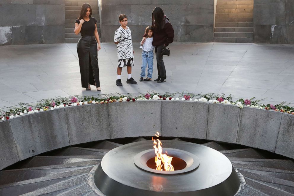 PHOTO: Kim Kardashian, Kourtney Kardashian and Kourtney's children Mason and Penelope Disick visit the Tsitsernakaberd Armenian Genocide Memorial Complex in Yerevan, Armenia, Oct. 8, 2019.