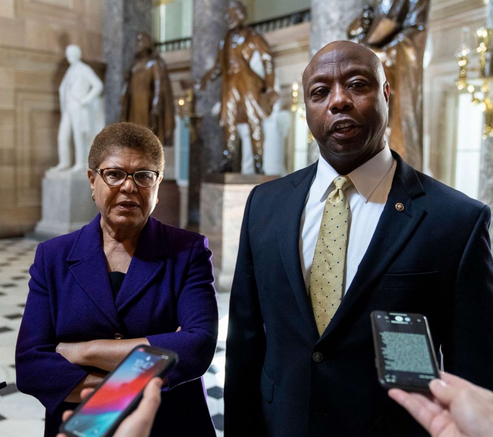 PHOTO: Rep. Karen Bass and Sen. Tim Scott speak briefly to reporter, May 18, 2021, in Washington, D.C.