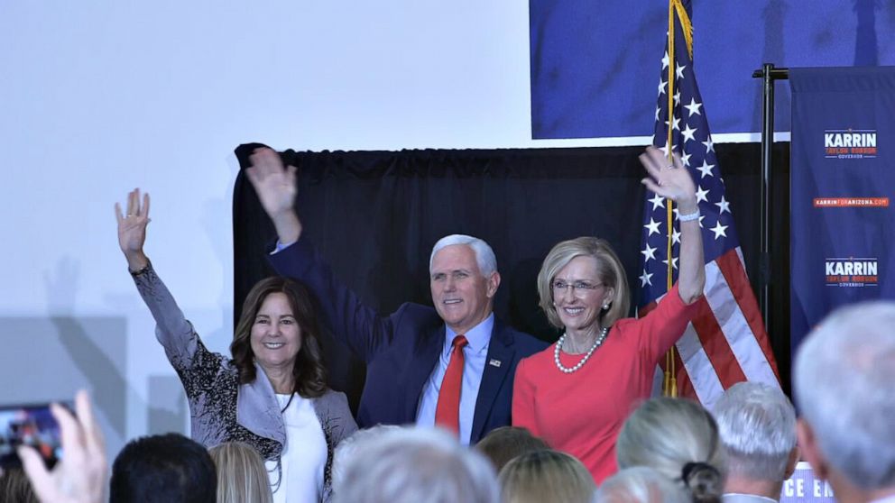 PHOTO: Arizona gubernatorial candidate Karin Taylor Robson (center) is joined by Karen Pence, Left, former Vice-President Mike Pence at an election campaign event in Peoria, Ariz., on Friday, July 22, 2022.